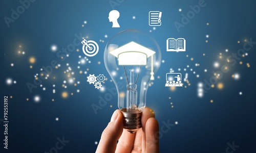 E-learning graduate program, hand holding lightbulb