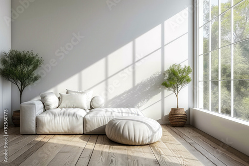 Living room with white couch ottoman and large window.