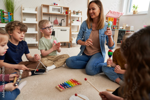 Children having music classes with music instruments