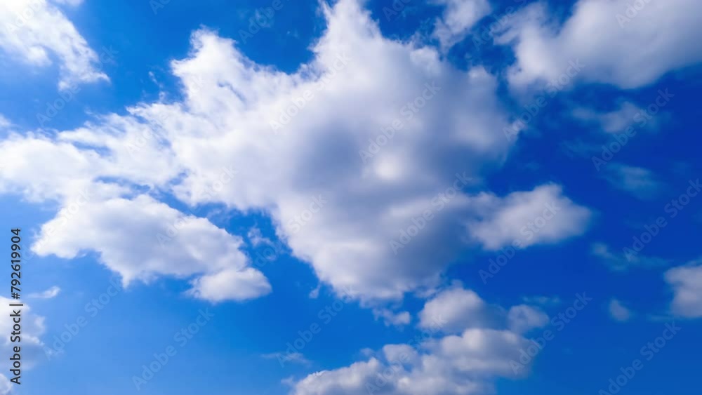 Soft cotton clouds transforming in the sky. Sun lighting the white cloudscape in atmosphere. Low angle perspective. Timelapse. Soft cotton clouds transforming in the sky. Sun lighting the white cloudscape in atmosphere. Low angle perspective. Timelapse.