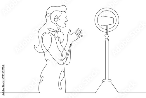 Influencer social media blogger recording video for blog.One continuous line.Blogger female character. Internet blogging, online broadcasting.Continuous line drawing.Line Art isolated white background