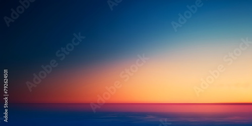 Gradient background shifting from deep sea blue to sunset orange, ideal for evoking feelings of calm and warmth in product displays #792624501