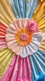 Fabric tablecloth with colorful handmade flowers. Closeup vertical view