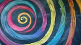 Spirals of colored chalk on a blackboard in a classroom