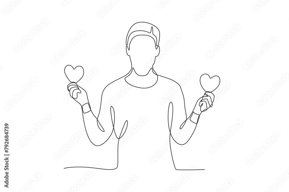 Man holding two love symbols. Love concept one-line drawing Man holding two love symbols. Love concept one-line drawing