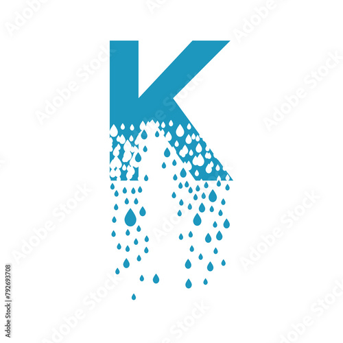 The letter K dissolves into droplets. Drops of liquid fall out as precipitation. Destruction effect. Dispersion