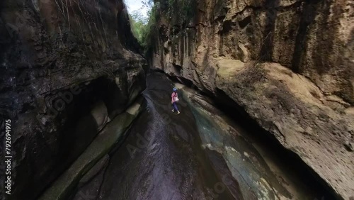 Woman hiking through Hell’s gate national park in Kenya