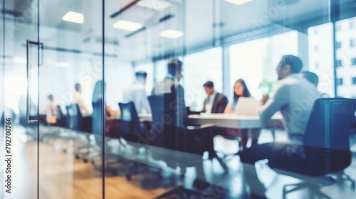 Business Team Engaged in Discussions Seen Through Blurry Glass Partition - Negotiation Techniques, Executive Leadership, Organizational Development, Management.