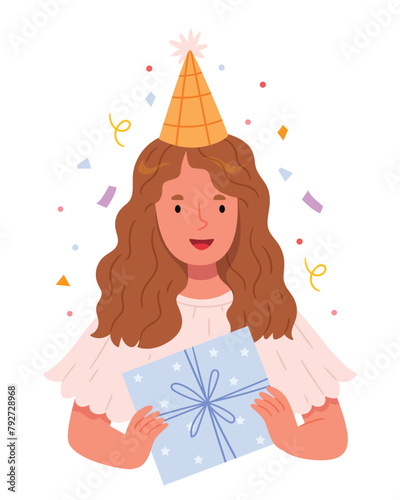 A girl in a holiday cap is holding a gift box.Birthday. Festive mood. Pastel colors.  