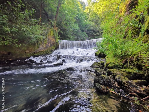 beautiful waterfall between mountain. - Krupajsko Vrelo - Serbia photo