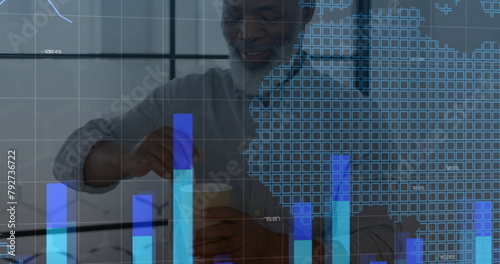 Image of financial data processing over african american businessman in office