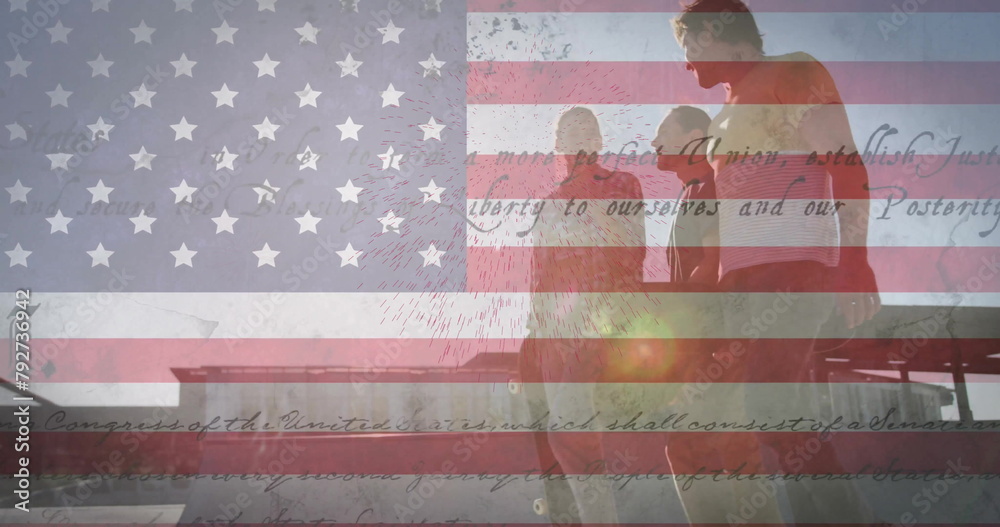 Fototapeta premium Image of flag of usa with text over diverse friends walking