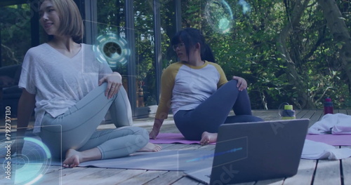 Image of data processing over asian mother and daughter with laptop practicing yoga