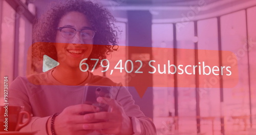 Image of subscribers text with growing number over biracial man using smartphone