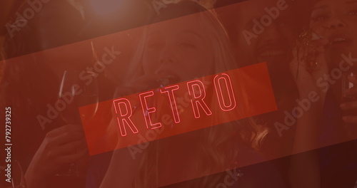Image of neon retro text in red over smiling friends at party