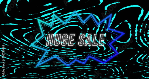 Image of huge sale text in angular shaped speech bubble over blue lights on black background