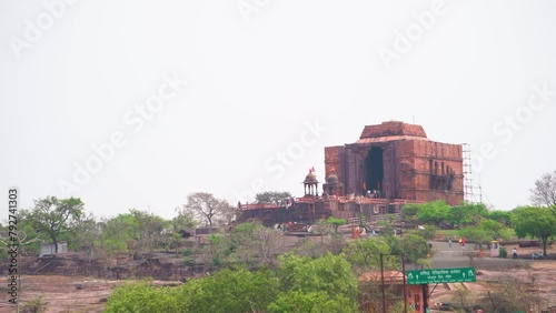 Pan shot of an Ancient hindu temple building of Bhojeshwar on hill top in Bhopal of Madhya Pradesh India photo