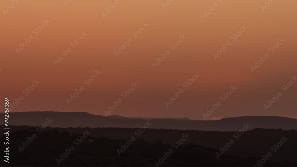beautiful sunset time lapse looking out over the distant hills in the Texas Hill Country beautiful sunset time lapse looking out over the distant hills in the Texas Hill Country