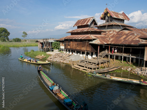 Tourists arrive by boat at monastery on Inle Lake, Shan State, Myanmar (Burma), Asia