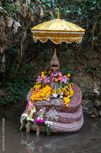 Aspects, views and visitors to the Wat Pha Lat Buddhist temple in the hills above Chiang Mai, Thailand photo