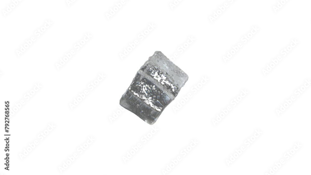 Ice cube on point, turning and isolated on plain white background. Video element and graphic. Restaurant, drink, bar concept. Ice cube on point, turning and isolated on plain white background. Video element and graphic. Restaurant, drink, bar concept.