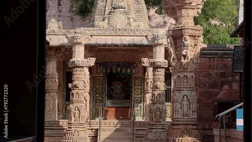 ancient jain temple artistic architecture at day from flat angle image is taken at Osiyan Mahaveerswami Shwetamber Jain Temple osiyan jodhpur rajasthan india. photo