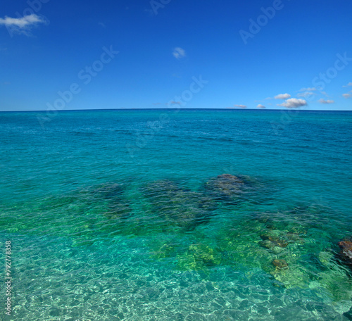 Beautiful transparent sea with blue sky © Alekss