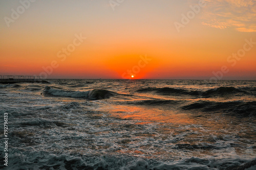 Sunset at the Imperial Beach. Cloudy sunset and pier in San Diego. © Valeria