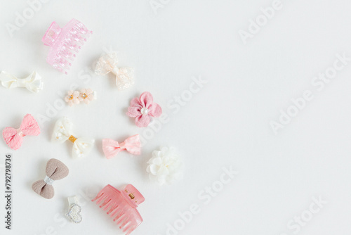 Set of trendy cute  accessories fot girl on white background. Hairstyles concept, top view, copy space