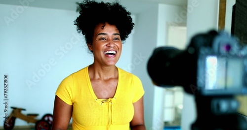 Картината върху платно One young black woman speaking in front of camera giving testimony for online channel