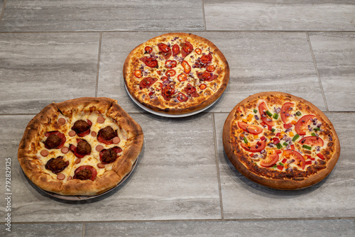 Mega Meat, Hot and Spicy and Vegetarian Pizzas