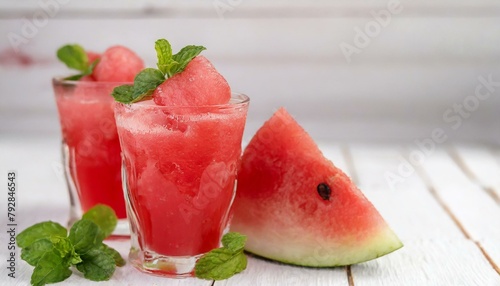 Watermelon juice on white wooden background. 