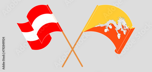 Crossed and waving flags of Austria and Bhutan