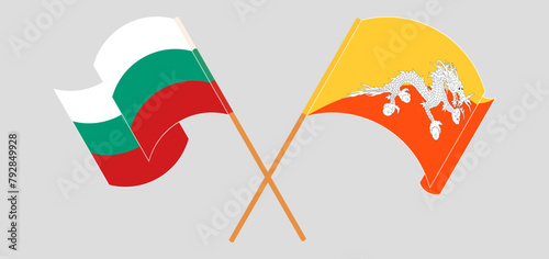 Crossed and waving flags of Bulgaria and Bhutan