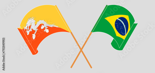 Crossed and waving flags of Bhutan and Brazil