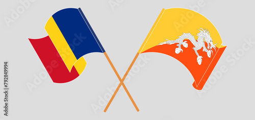 Crossed and waving flags of Romania and Bhutan