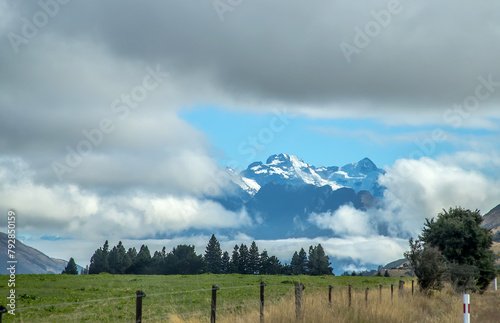 Mountains clouds and forest , autumn season, area of the Lake Wakatipu, New Zealand, South Island