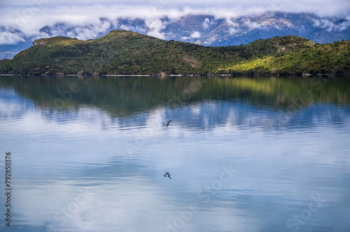 Mountain and reflection, scenic view of Lake Wakatipu, New Zealand, South Island