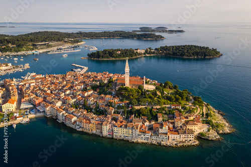 Rovinj, Croatia: Dramatic aerial view of the famous Rovinj medieval old town with its Venetian campanile in Istria by the Adriatic sea in Croatia photo