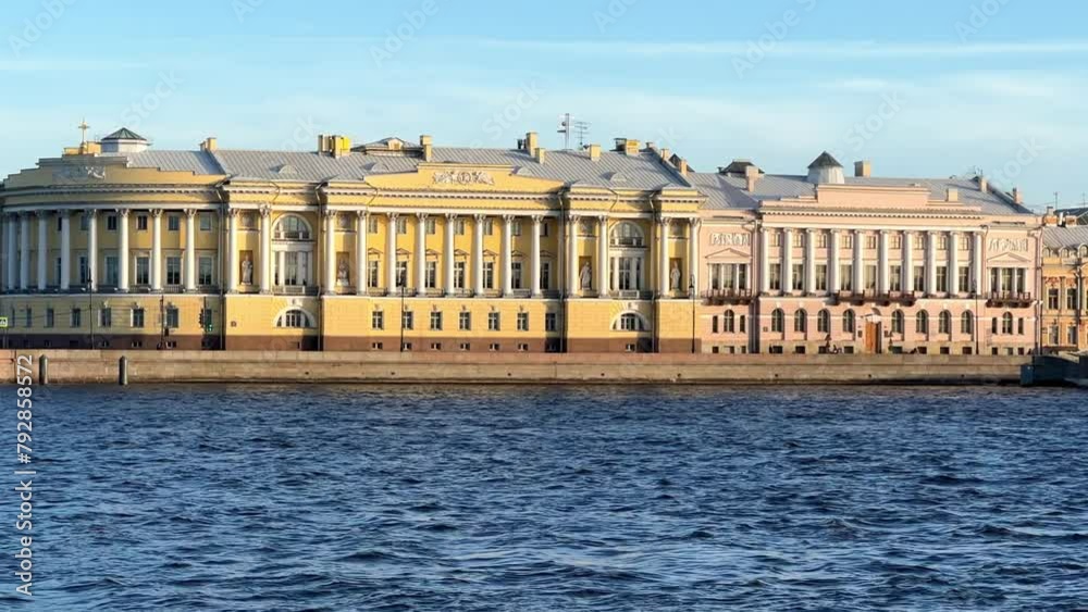 St. Petersburg, Russia - April 20, 2024. The University embankment of the Neva River. View of the sights of the city from the palace bridge. Panoramic view of the Neva River and the Palace embankment. St. Petersburg, Russia - April 20, 2024. The University embankment of the Neva River. View of the sights of the city from the palace bridge. Panoramic view of the Neva River and the Palace embankment.