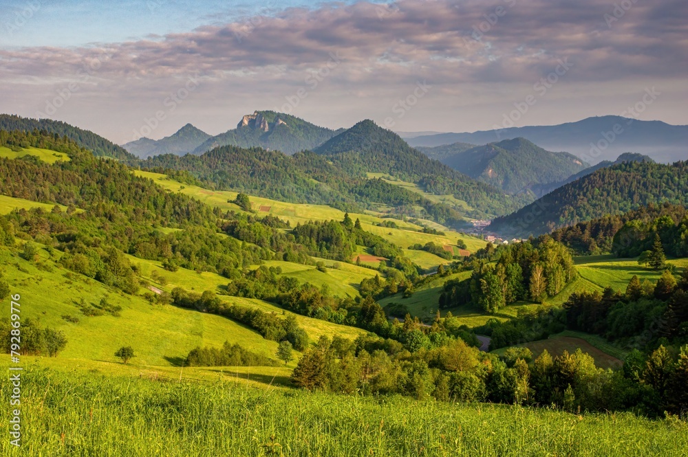 Mountain pass in Pieniny in Poland. Beautiful, dynamic and hazy sky over the mountains. Slovakia and Poland countryside.Mountain hiking, healthy lifestyle