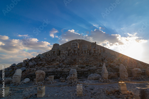 Statues on the Mount Nemrut at sunset. Travel to Turkiye concept photo photo