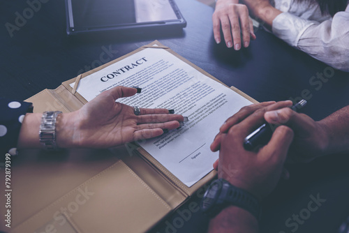 Business peoples reading documents at meeting, business partner considering contract terms before signing checking legal contract law conditions. Selected focus