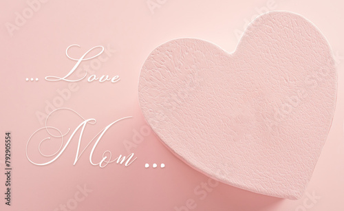 Happy mother's day and love decoration background concept made from hearts and rose on pastel pink background.