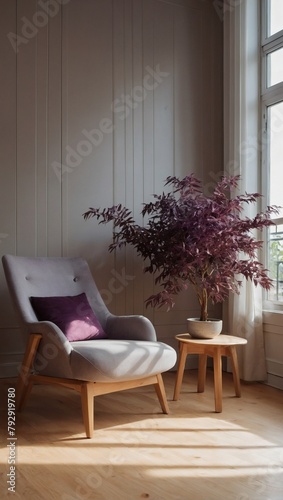 Gray Armchair with Purple Plant in Sunlit Room with Cream Wall and Maple Parquet Flooring
