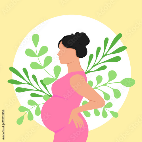 A pregnant woman in a pink dress on a background of flowers