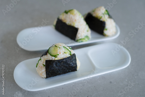 Homemade Onigiri Kyuri, rice triangle with cucumber, sesame seeds, ginger, nori seaweed (ID: 792921522)