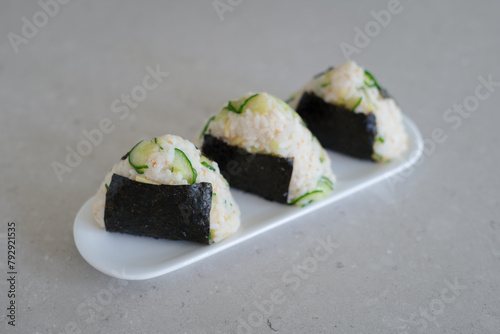 Homemade Onigiri Kyuri, rice triangle with cucumber, sesame seeds, ginger, nori seaweed (ID: 792921535)