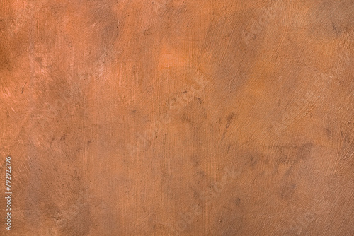 Copper coloured painted surface with metallic enamel and visible brush strokes