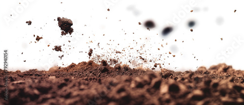 Dirt and soil particles billow up into the air.